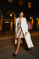 Klassisk, dobbeltspent ullkåpe i krem - fin til høst og vinter