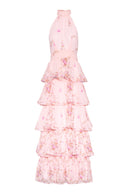 Floral, feminine halterneck dress with open back that is perfect for wedding guest.