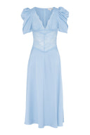 Midi lace dress in light blue, featuring shoulder pads and v-neckline.