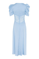 Midi lace dress in light blue, featuring shoulder pads and v-neckline.
