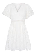 Feminine mini dress featuring white embroidery.