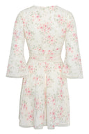 Floral mini dress featuring fitted waist and flowy sleeves.