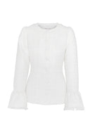 Feminine tweed jacket featuring a rounded neckline and fitted silhouette.