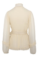 Bluse med gjennomsiktige ermer og knyting i midjen - perfekt til jobb eller fest